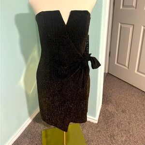 Large , gold and black dress. Size large but is more like a medium.